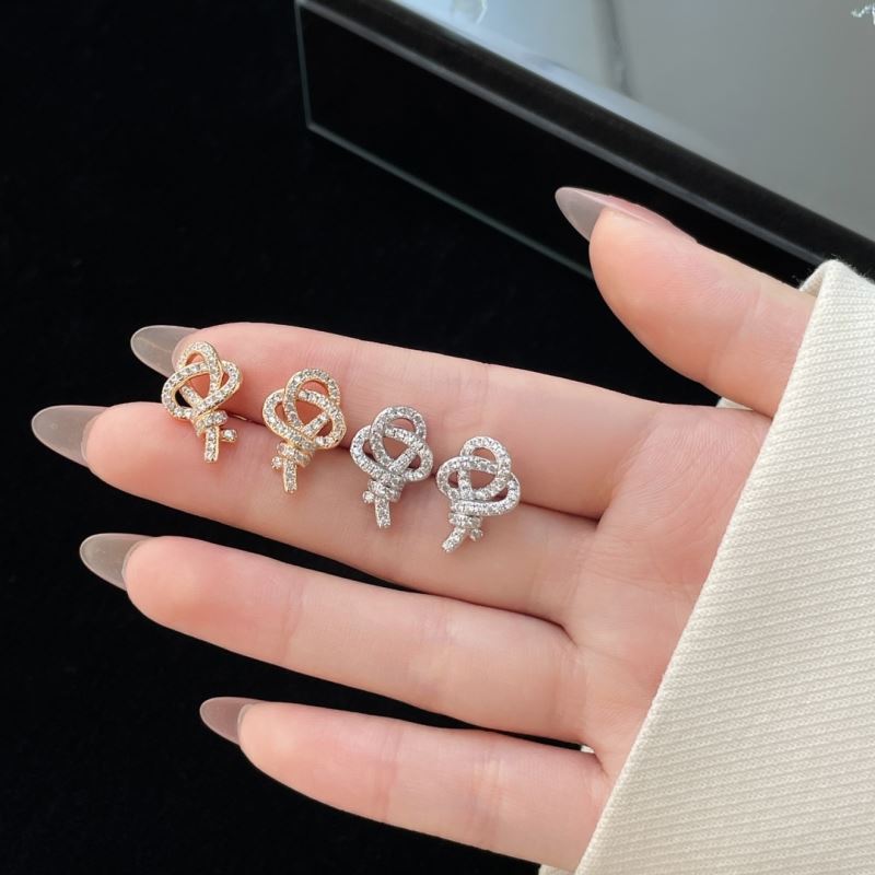 T*f*ny earrings
